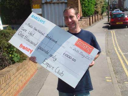 Cheeky Scott, Frenzy resident DJ walks in with the cheque